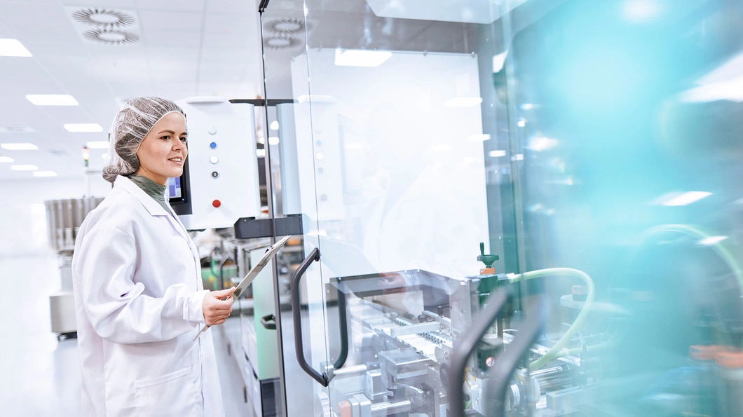 Researcher in front of her lab